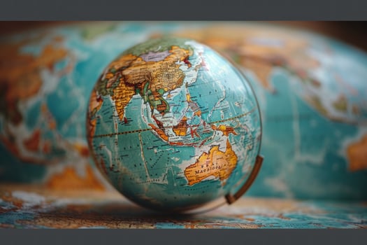 Detailed world globe on map background vintage style geography photo