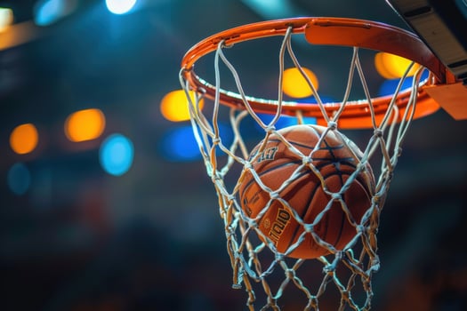 Basketball scoring point in hoop net indoor sport photo