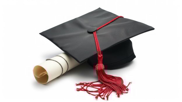 Graduation cap and diploma isolated on white background for education success photo