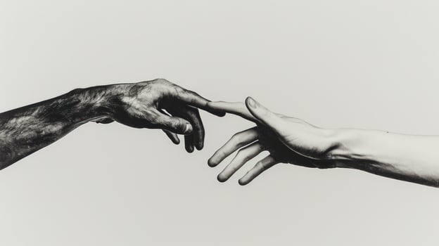 Reaching hands black and white conceptual studio shot photo
