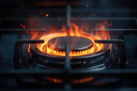 A gas stove with flames coming out of it photo
