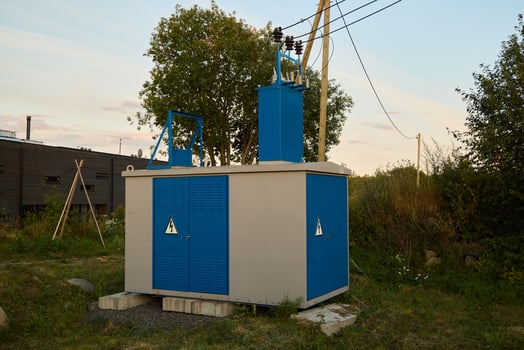 An Outdoor Electrical Substation that features Blue Accents throughout its design elements photo