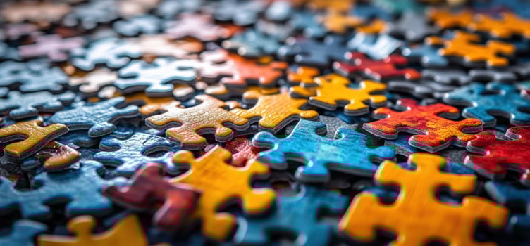 Closeup of colorful puzzle pieces. photo