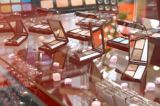 Eye Shadows on the window in a cosmetic store photo