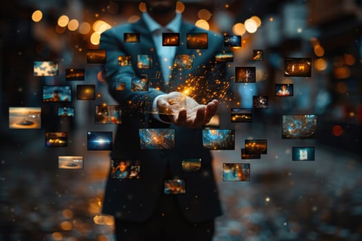 A businessman with his hands outstretched, holding a glowing sphere of images, symbolizing the vast amount of data and information available in the digital age. photo