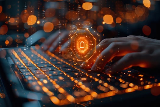 Closeup of hands typing on a laptop keyboard with a glowing security icon above. photo