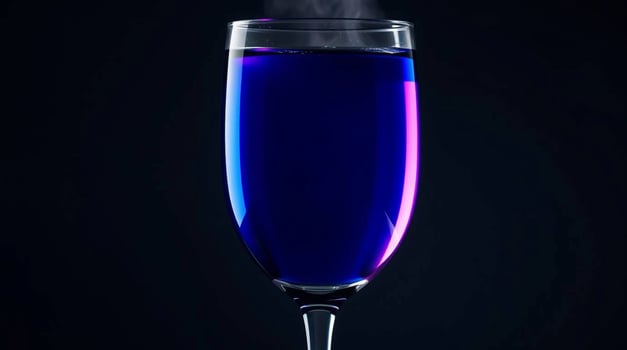 Mysterious Blue Elixir A Vibrant Glass of Mystery Beverages photo