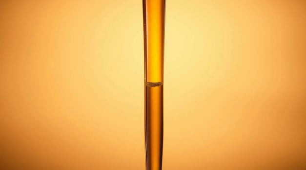 A glass of liquid with a straw in it photo