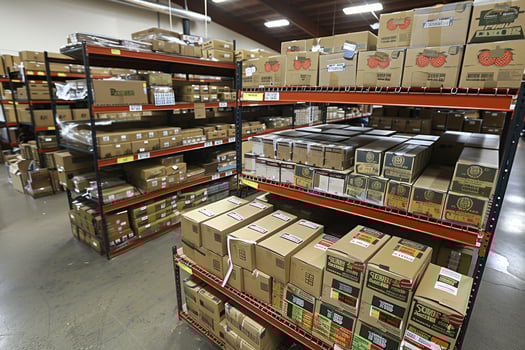 Brown and white box stack in a large warehouse for effective inventory organization and management photo