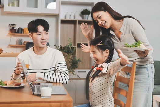 Family enjoying meal time together photo
