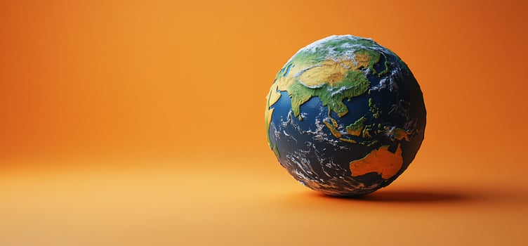 Stylized Earth globe on orange background. photo