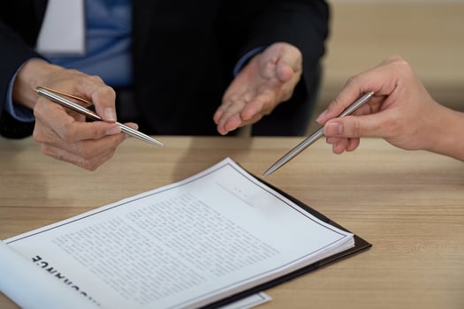 Engaging Discussion on Insurance Policy Between Agent and Client photo