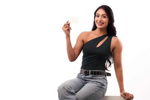 Young Woman Holding A Business Card Stock Photo