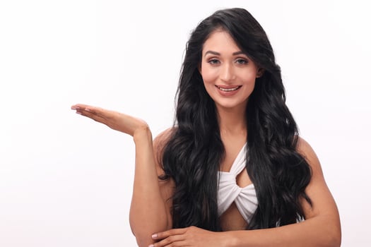 Smiling Woman Presenting Copy Space photo