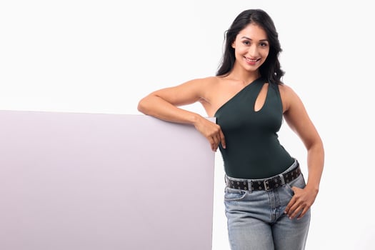 Smiling Woman With Blank Billboard photo