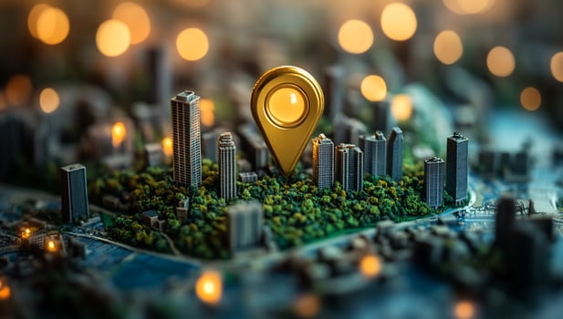 Golden location pin on a miniature city model at night. photo