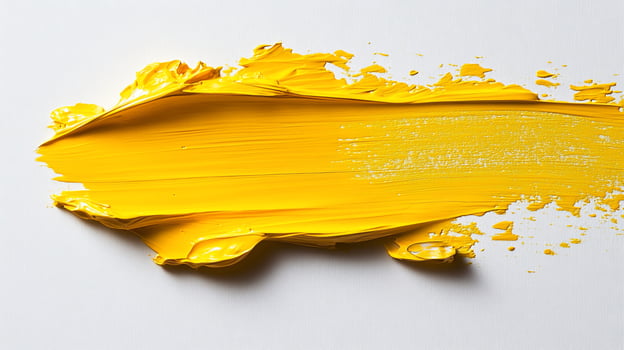 Abstract yellow oil paint stroke on white background. photo