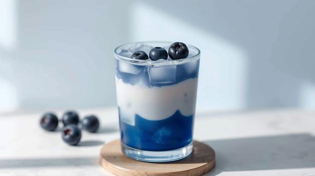 Blueberry yogurt drink with blueberries photo