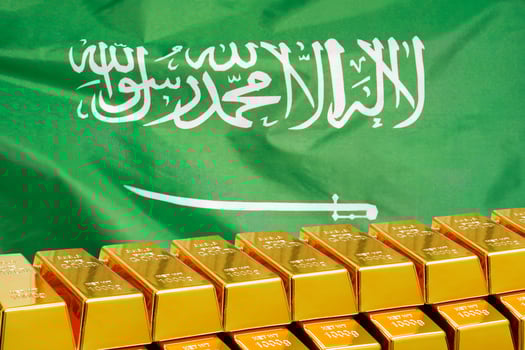 Row of gold bars on the Saudi Arabia flag background photo