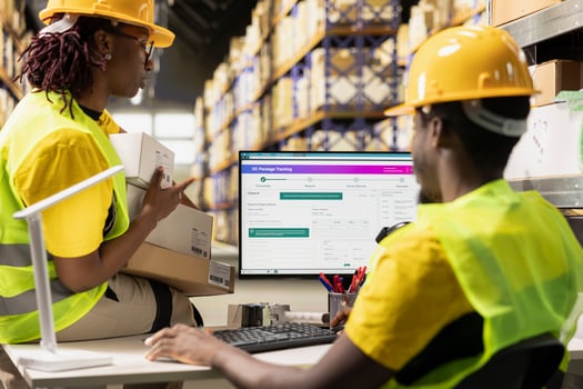 Fulfillment center staff updating the package tracking software with route details and other information for clients, overseeing e-commerce orders for express delivery. Dispatch coordination. photo