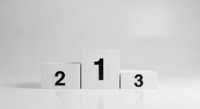White podium with numbered cubes indicating first second and third place photo
