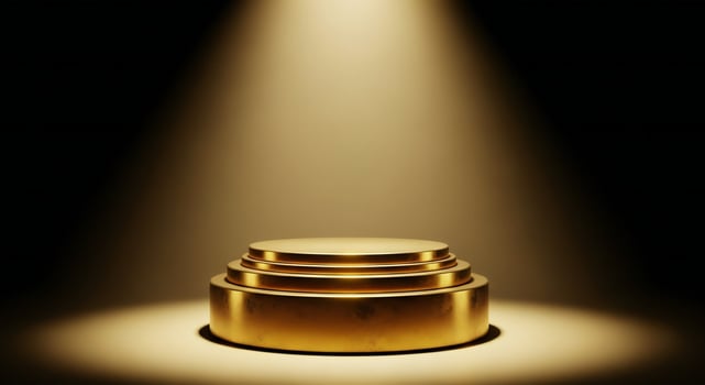Three tiered golden podium illuminated by a single spotlight against a dark background photo