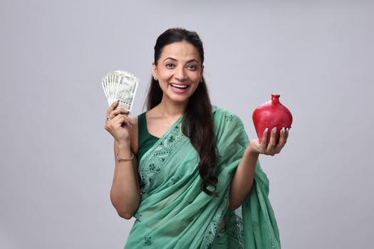 Woman with money and red pot photo