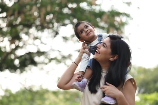 Mother and child enjoying outdoors together photo