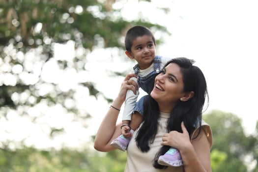 Mother and child enjoying a playful moment photo