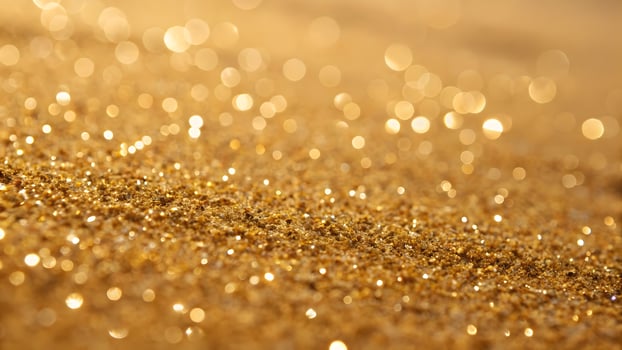 Golden Glitter Dust Shimmering Bokeh Background for Festive Celebrations and Luxury Texture Design photo
