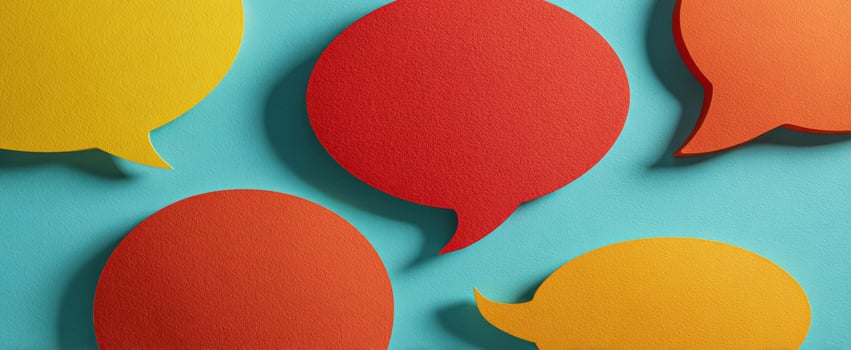 The vibrant speech bubbles against a bright teal background enhancing communication creativity. photo
