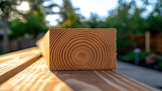 Closeup of a Square Wooden Beam,Sunlight illuminating the natural wood grain, showcasing its texture and color. Construction Material Detail photo