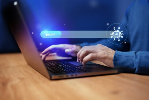 User interacting with AI interface on laptop during evening work session photo