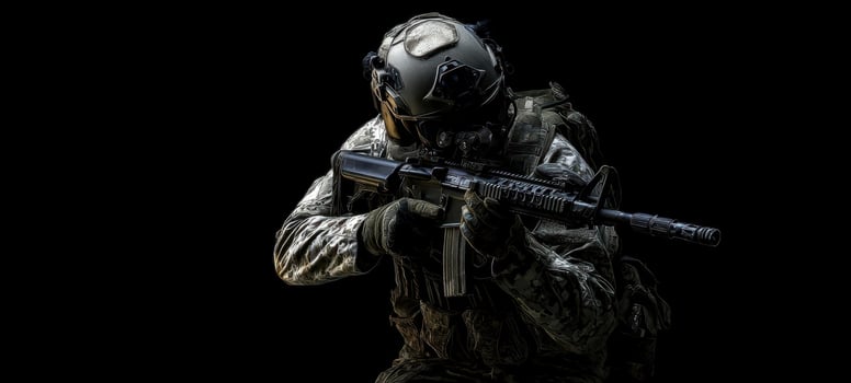 The soldier in tactical gear poised for action in a dramatic dark setting. photo