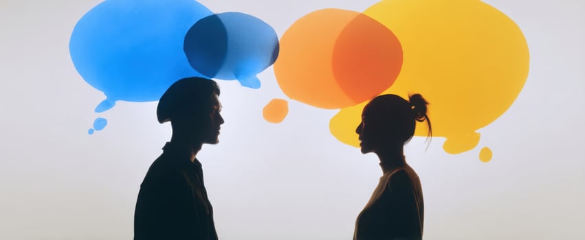 The silhouettes of two people engaged in a colorful conversation with thought bubbles. photo