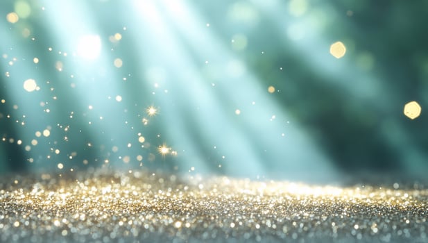 Sparkling gold glitter, sunbeams, bokeh background photo
