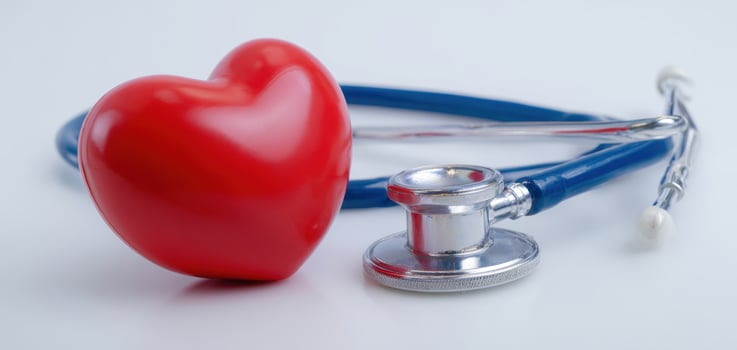 The heart and stethoscope symbolize love and care in healthcare context. photo