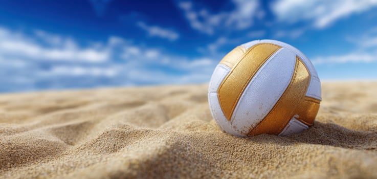 The colorful volleyball resting softly on sandy beach under a bright blue sky photo