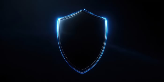 The glowing shield symbol representing security and protection in a digital world. photo