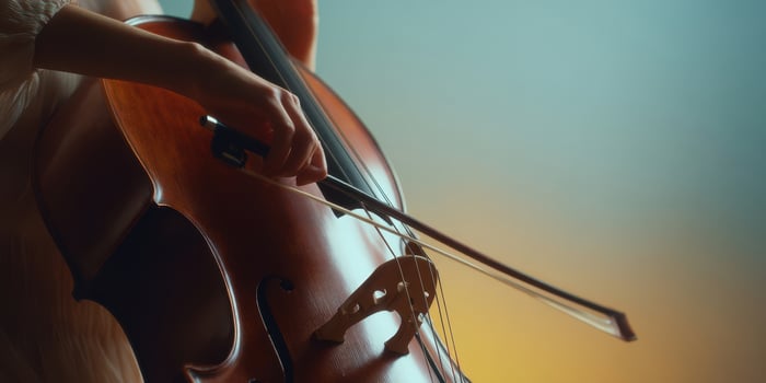 The elegant cello played by a skilled musician in a serene environment. photo
