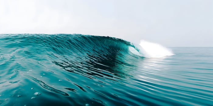 Ocean wave curling turquoise water sea photo