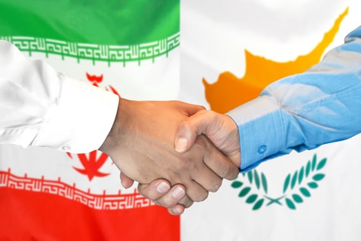 Handshake on Iran and Cyprus flag background. photo