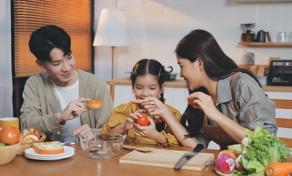 Family cooking fun in the kitchen photo
