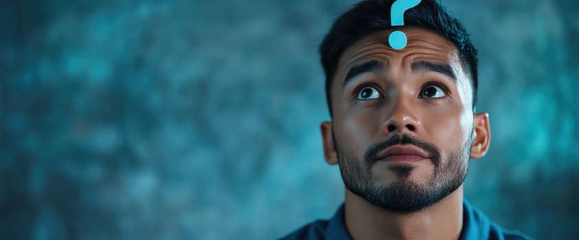 Man Contemplating, Question Mark Above Head, Blue Hue photo
