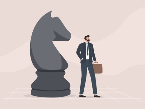 Businessman playing chess with big figures vector