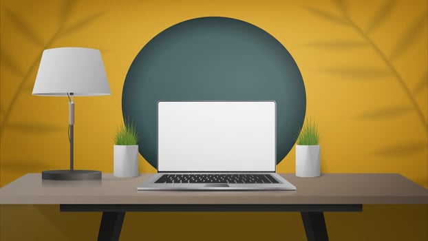 A laptop on a table with a lamp and plant vector