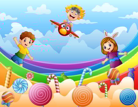 Happy kids playing on a candy land illustration vector