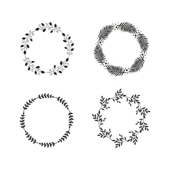 Four round vintage frames or wreaths of black branches with leaves on white background. Modern hand drawn floral design. Vector illustration