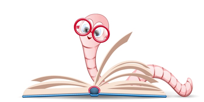Bookworm reading book vector
