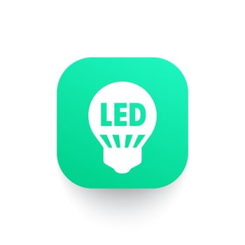 led light bulb icon on green shape vector